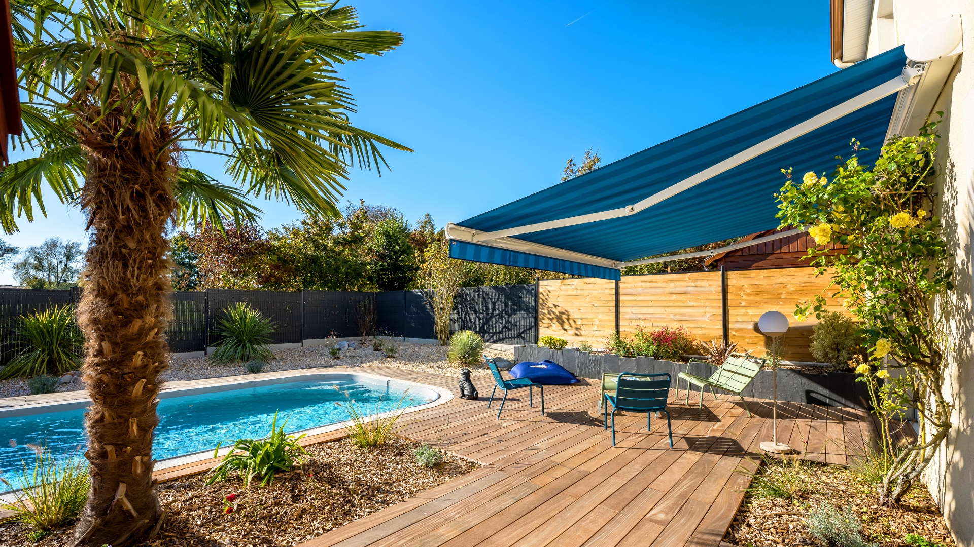 Store banne Linconyl terrasse en bois